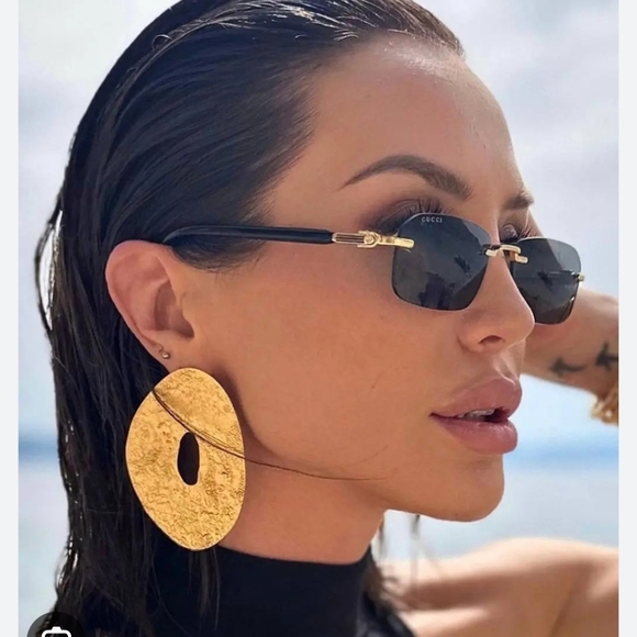 Gucci Other - Gucci Black and Gold Unisex Sunglasses GG1221S 001